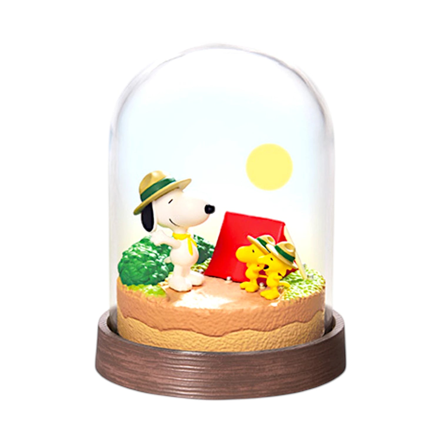 Mini glass terrarium with Snoopy in a hat, red gift box, on round stand