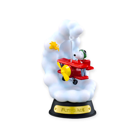 Snoopy piloting red biplane with Woodstock flying beside in cloud formation on black base labeled Flying Ace