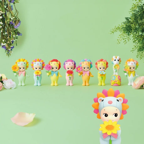 Mini flower gift toy figure set, with one larger figure in front of smaller dolls