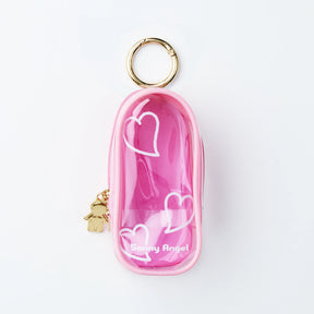 The Sonny Angel My Bestie Case - Pink is a small, pink, transparent zippered pouch with white heart designs, a gold keyring, and "Sonny Angel" printed on the front.