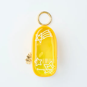 Glossy yellow Sonny Angel My Bestie Case with shooting star design and gold-tone zipper charm, front view gallery one