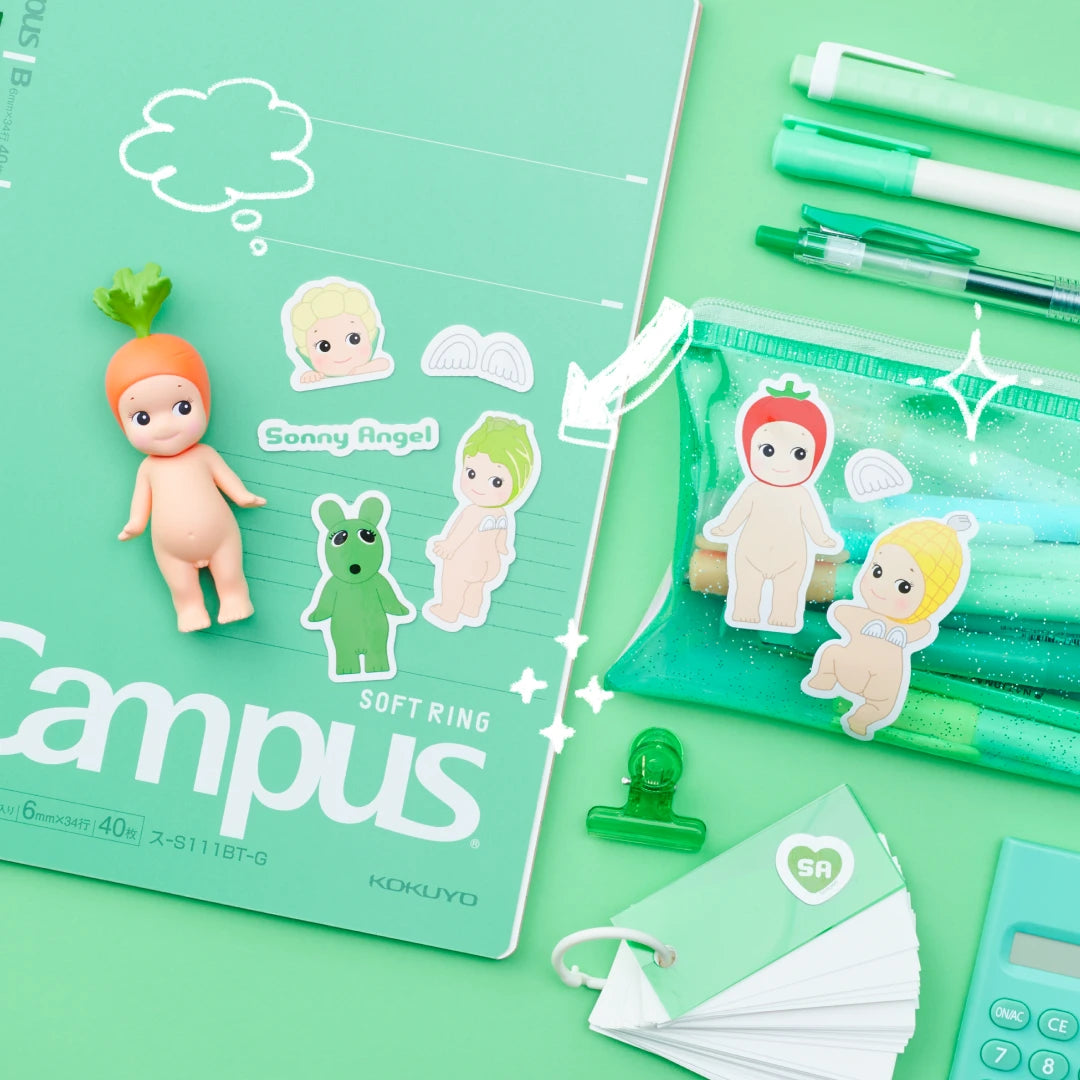 A lively green stationery arrangement showcasing a notebook, pens, pencil case, and calculator against a vibrant green backdrop. This setup is enhanced with Sonny Angel's durable water-resistant stickers from their Blind Box - Sticker Pack Series 2 and features an adorable small doll wearing a carrot hat. It's the ideal combination for any creative environment!