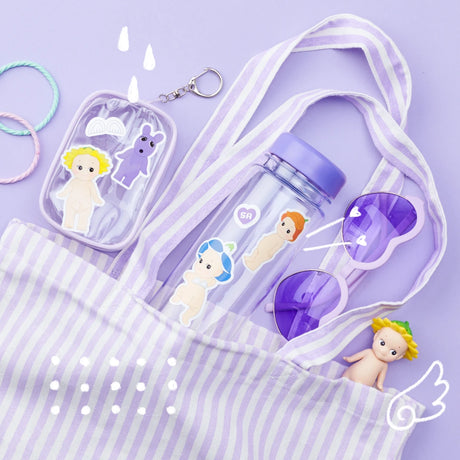 Sonny Angel Blind Box - Sticker Pack Series 2 featuring a tote bag with a water bottle, sunglasses, keychain, and two bracelets on a purple background. Decorated with cartoon illustrations and Sonny Angel mystery sticker sets for added charm.