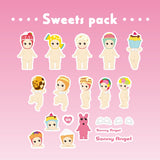 Illustration of small, nude baby figurines with various sweet-themed hats, such as cupcakes and cookies, showcased on a pink background labeled "Sweets Pack." These stickers from the Sonny Angel Blind Box - Sticker Pack Series 2 by Sonny Angel are durable and water-resistant, making them perfect for adding charm to any collection or mystery sticker set.