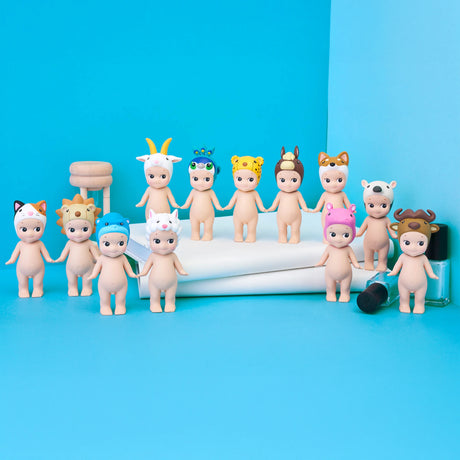 Twelve Sonny Angel Animal Version 4 - Blind Box collectible dolls by Sonny Angel wear colorful animal hats, arranged in two rows on a blue background with a gavel and scroll—perfect for blind box fans.