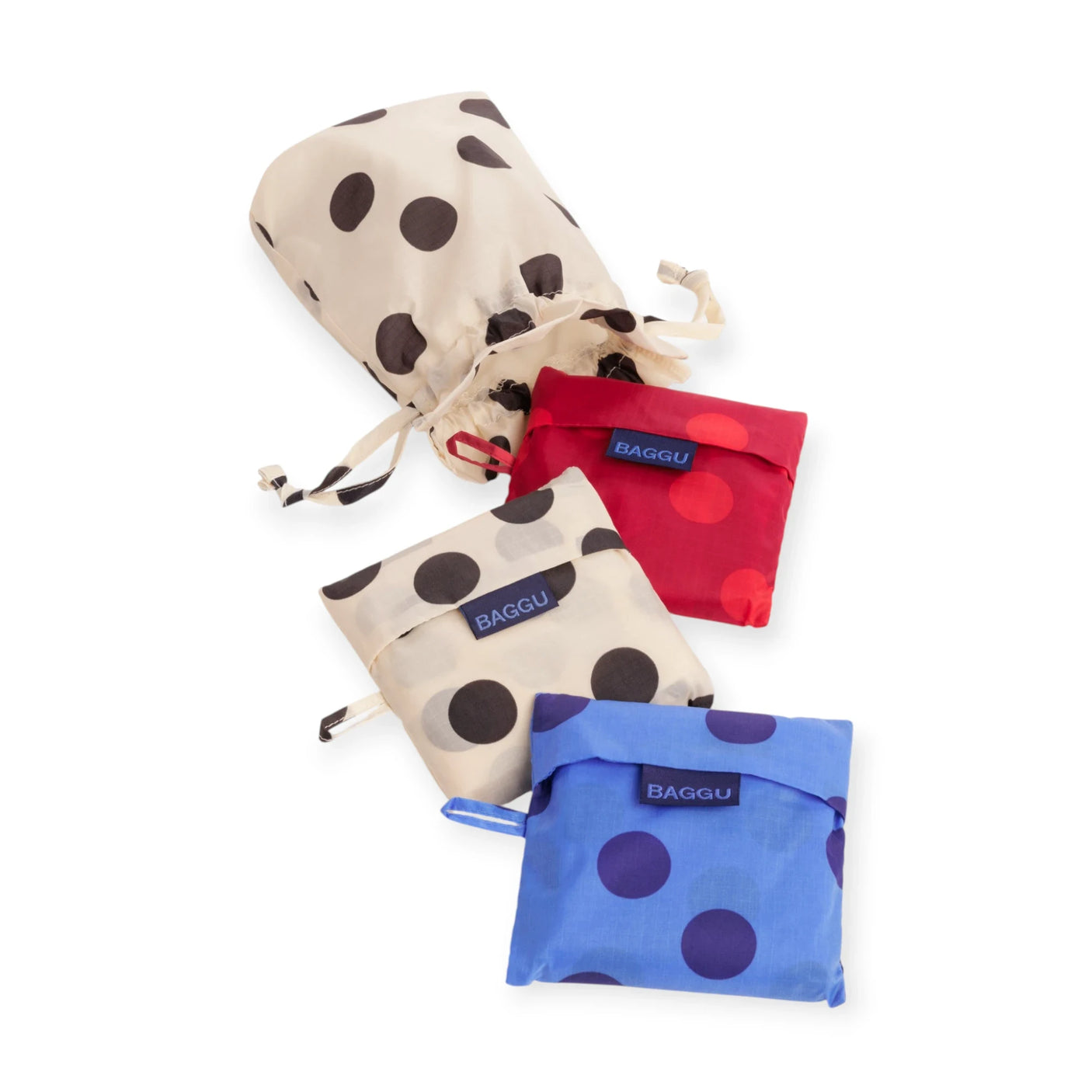 Set of 3 polka dot reusable bags in beige, red, and blue with Baggu logo