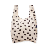 White polka dot reusable tote bag with U-shaped opening, dark spots