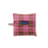 Standard Baggu reusable bag, pink plaid tartan, folded pouch with logo label