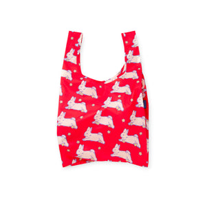 Bright red reusable bag with light pink bunny and small white flower pattern on white background