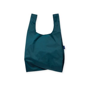 Dark teal reusable shopping bag with wide handles and lightweight fabric against a white background
