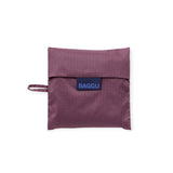 Baggu Standard bag folded into pouch in wild plum, blue Baggu logo label
