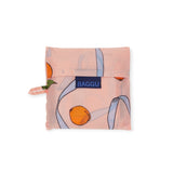 The Standard Baggu Bag - Apricots & Ribbons by Baggu enhances errands with an apricot design on light pink, made from recycled ripstop nylon for eco-friendly style.