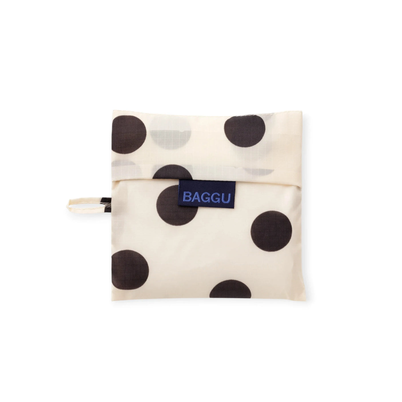 Cream black polka-dot tote bag, folded pouch style, BAGGU blue logo patch
