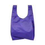 Mini reusable tote bag in cobalt blue with red smiley circle pattern