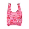 Pink reusable grocery tote bag with all-over Mercado-style print