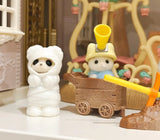 White hooded animal figurine with brown wagon and yellow handle