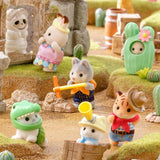 Assorted animal baby figurines with colorful accessories