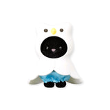 Black-and-white bear figure in a blue skirt, hooded with a starry pattern.
