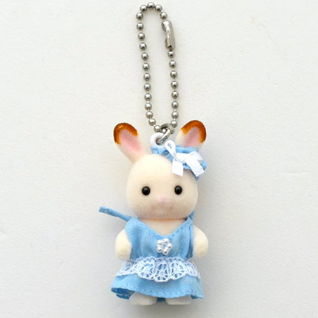 White plush baby rabbit keychain with blue dress, bow, and silver bead ball chain