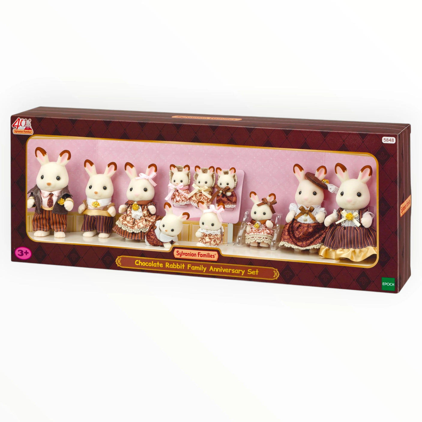 Sylvanian Families - Chocolate Rabbit Family Anniversary Set with nine detailed plush animal figures in elegant clothing in packaging