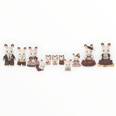 Sylvanian Families - Chocolate Rabbit Family Anniversary Set showing twelve detailed plush rabbits in vintage style clothing