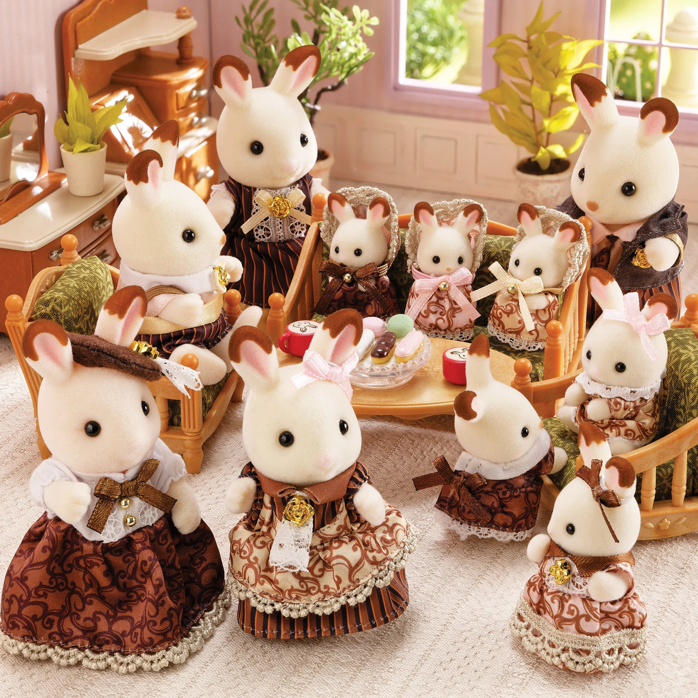 Sylvanian Families - Chocolate Rabbit Family Anniversary Set featuring ten plush rabbits in detailed clothing in a cozy room setting