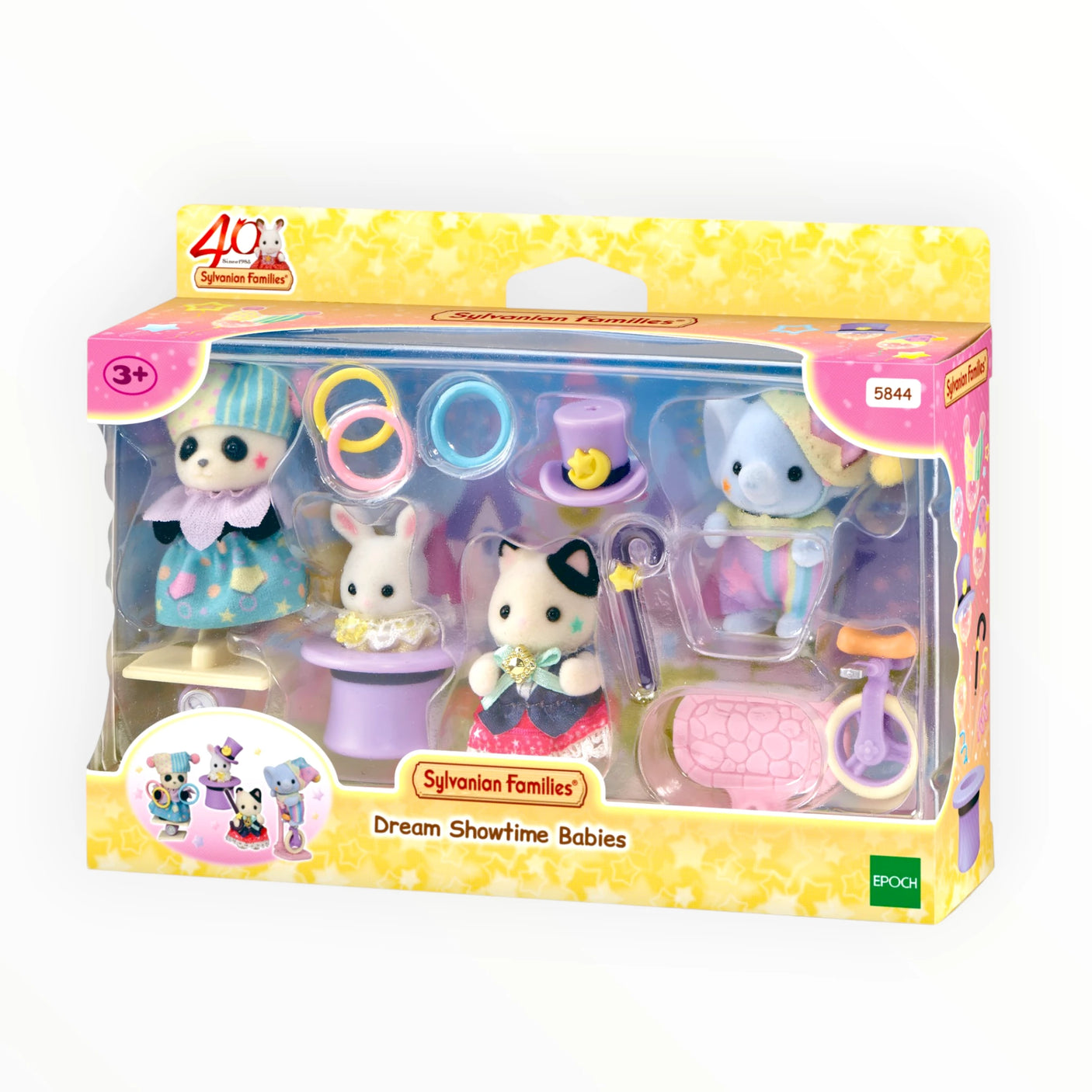 Sylvanian Families - Dream Showtime Babies featuring four plush animal babies with colorful performance outfits and accessories in packaging