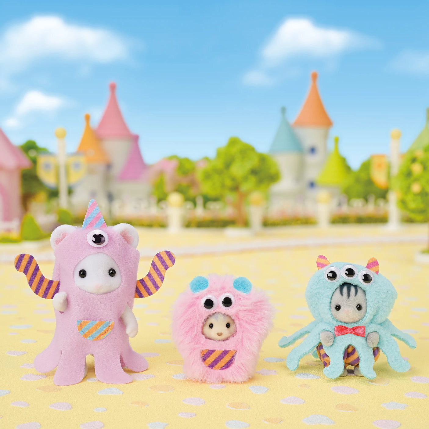 Sylvanian Families - Funny Monster Trio featuring three plush figures in colorful monster costumes with moving goggle eyes.