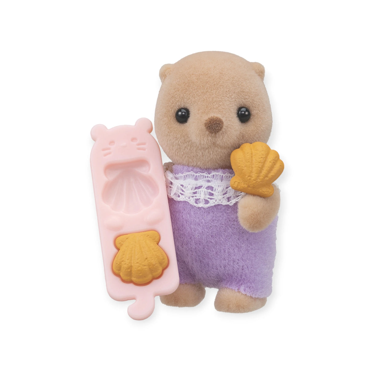 The Sylvanian Families Blind Bag - Baby Treats series includes an adorable toy otter in a purple outfit with a shell-shaped cookie and pink mold. Ideal for collectors, this character enhances the charm of the collection.