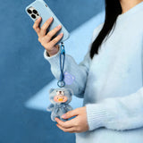 Teddy LuLu - Whispers of Nature Plush Charm - Blind Box showing a blue teddy-suit plush charm clipped to a phone by LuLu The Piggy