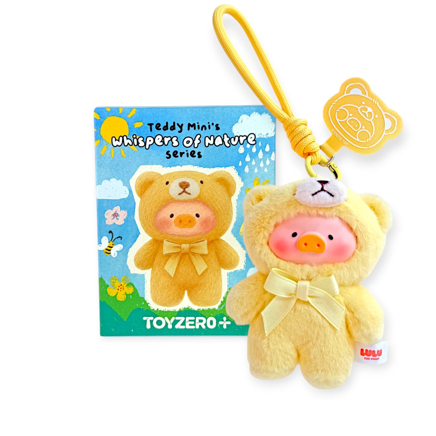 Teddy LuLu - Whispers of Nature Plush Charm - Blind Box showing soft teddy-clad piggy charm with yellow bow by LuLu The Piggy