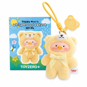 Yellow and cream plush bear charm with string tag, with series box packaging