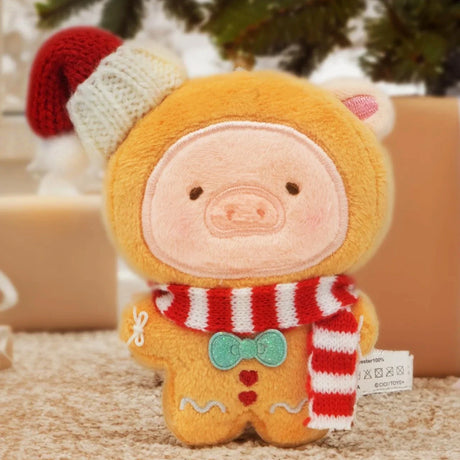 LuLu the Piggy - Gingerbread Man Keychain by LuLu the Piggy is a festive Christmas ornament featuring a cute piggy in a gingerbread outfit, perfect for hanging near gifts or on your holiday tree.