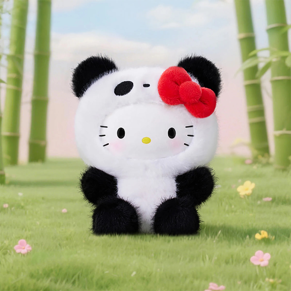 White panda plush pendant with black ears and red bow, soft stuffed toy.
