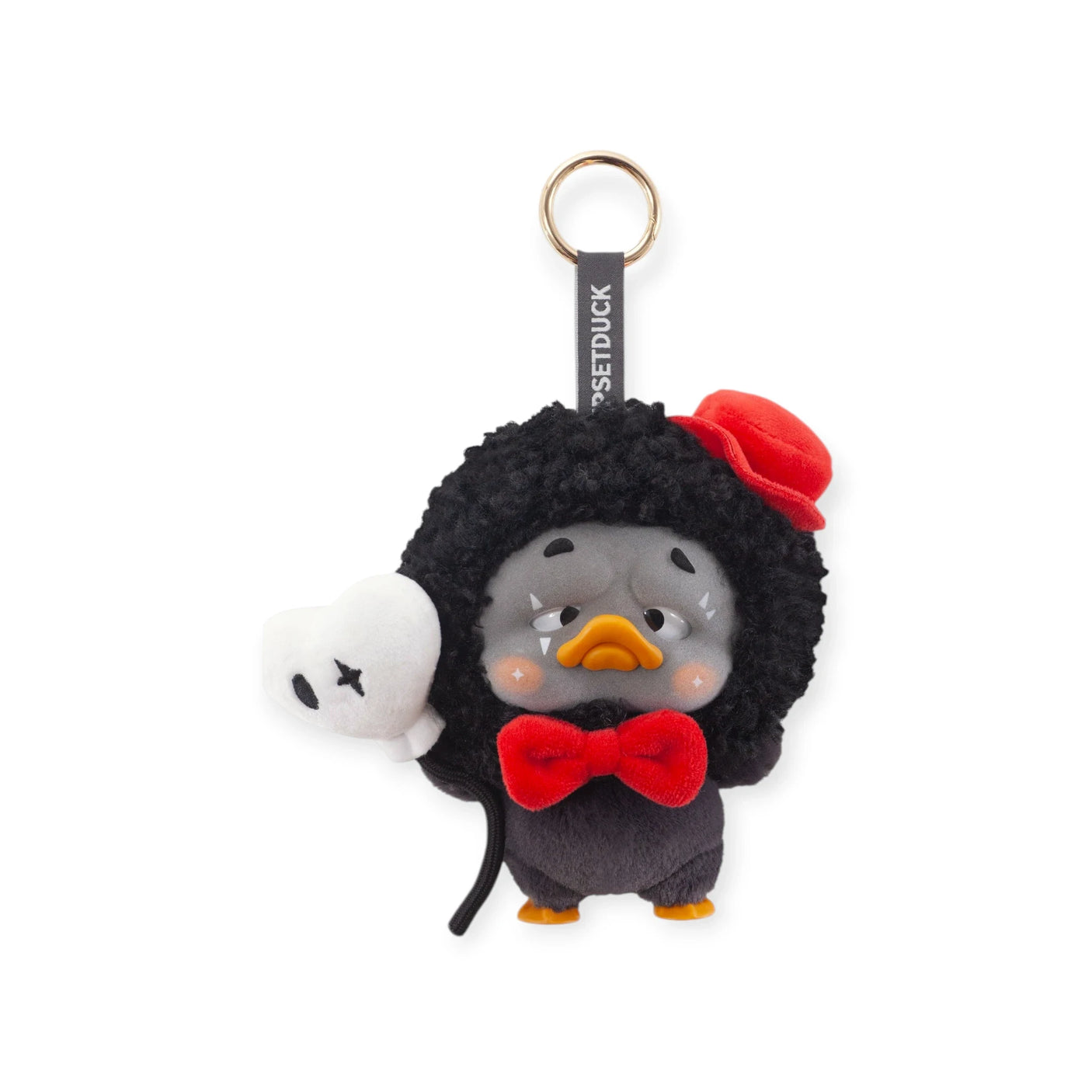Upset Duck Blind Box - Colourful Player Plush Keychain showing a black duck with curly hair, red bow tie, and mini red hat by Upset Duck