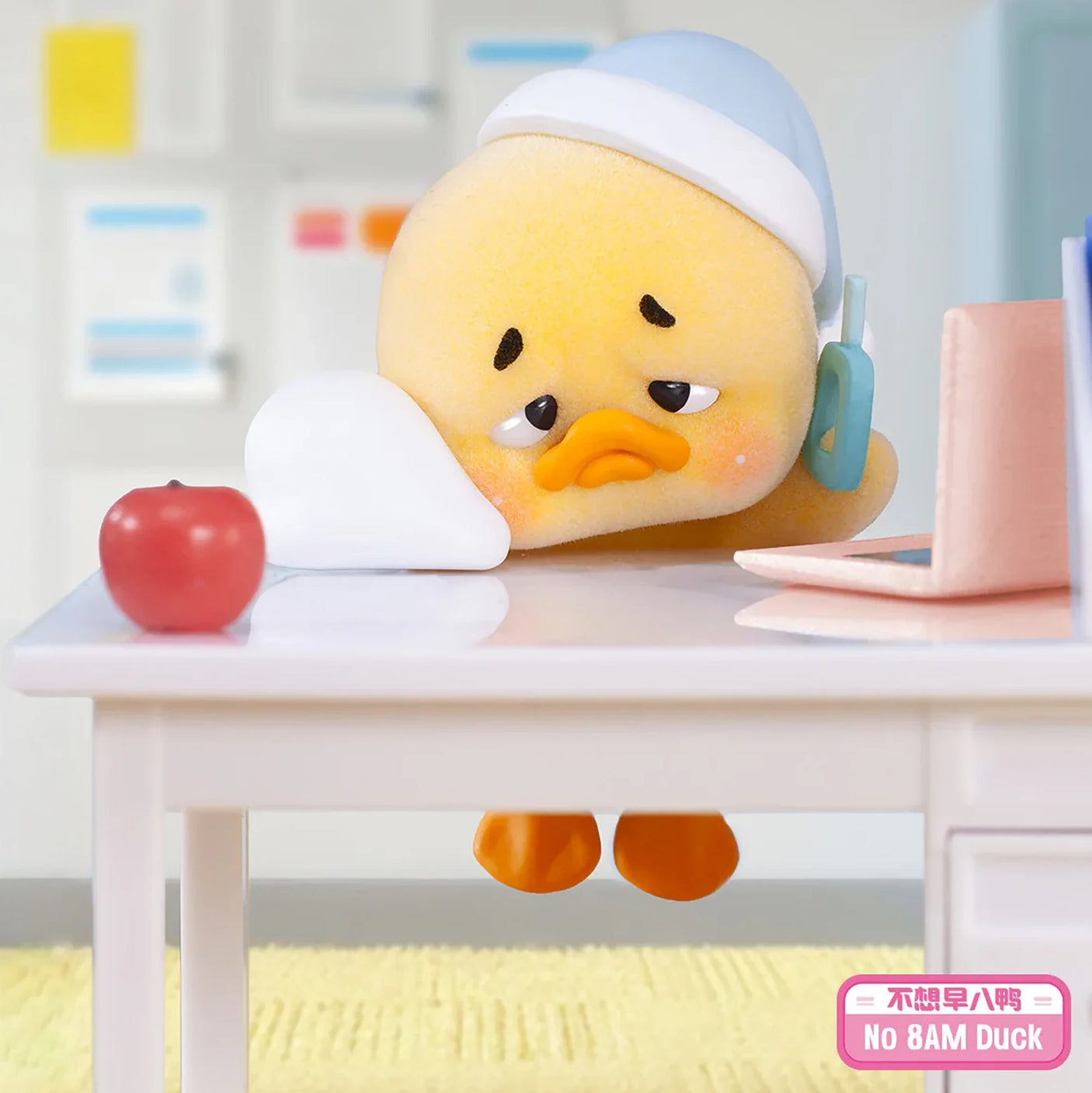 Upset Duck Blind Box - Status Display showing a tired yellow duck with pajamas and phone sitting at a desk by Upset Duck