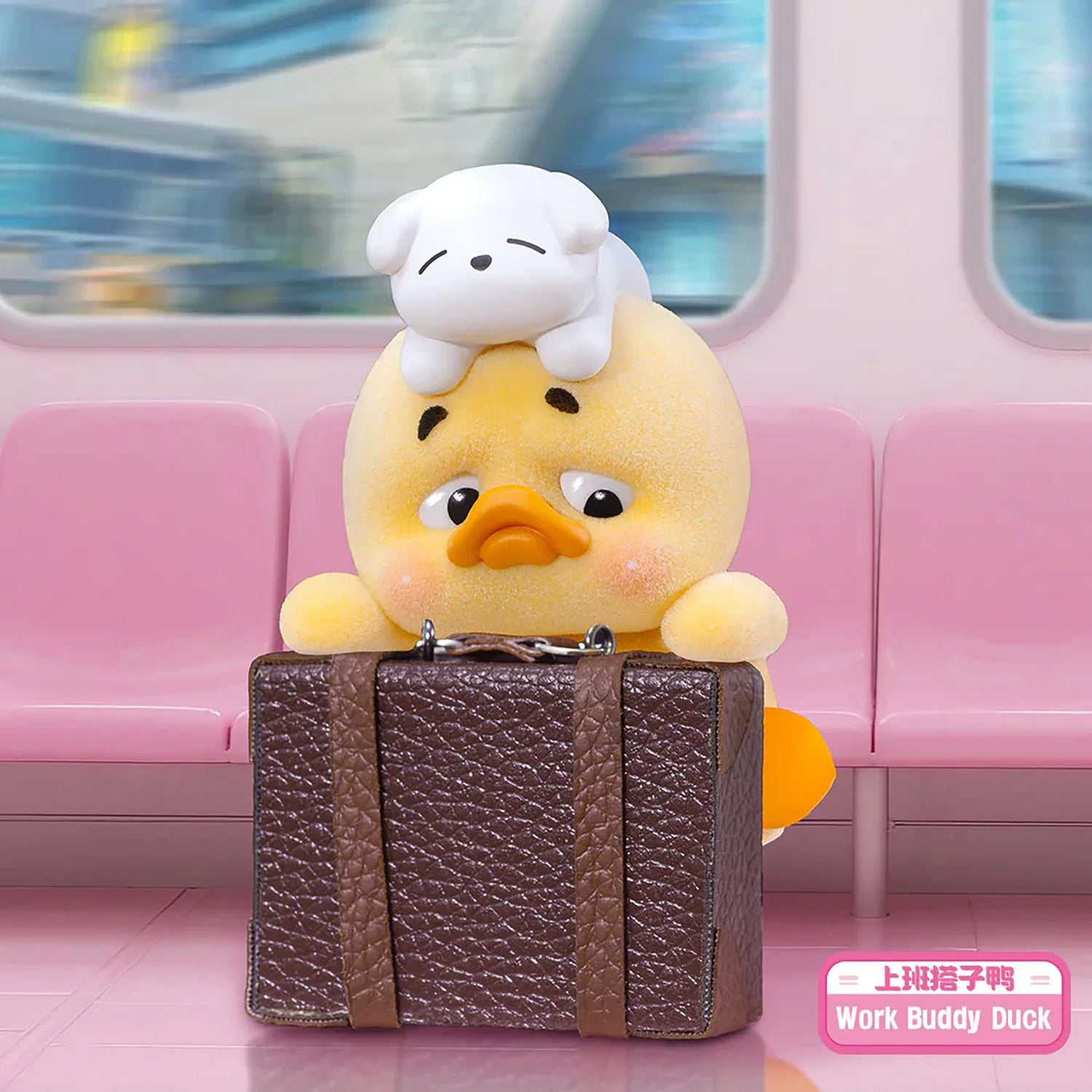 Upset Duck Blind Box - Status Display showing a small yellow duck with a dog figure on its head holding a brown briefcase by Upset Duck