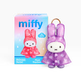 Purple plush rabbit raincoat keychain in a retail box labeled miffy