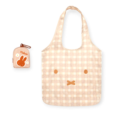Beige check tote bag with bunny face and matching zip keychain pouch