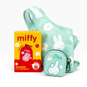 Mint green 2-in-1 tote bag with white rabbit print, flower details, and zipped keychain pouch
