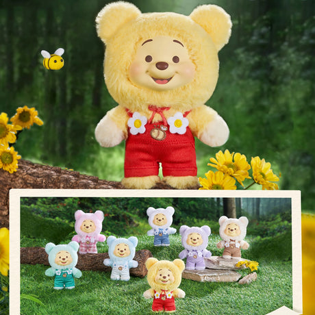 Winnie the Pooh Candy Bear vinyl plush dressed in yellow fuzzy bear suit with red overalls and flower accents in forest setting