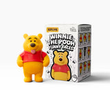 Winnie the Pooh Funny Faces blind box figure with red shirt and smiling bear pose