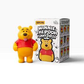 Winnie the Pooh Funny Faces blind box figure with red shirt and smiling bear pose