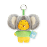 Gray elephant-eared plush keychain with Pooh face, green outfit, and blue book tag.