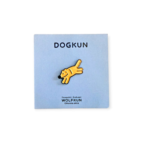 Orange cartoon dog thumb-up enamel pin on a light blue display card