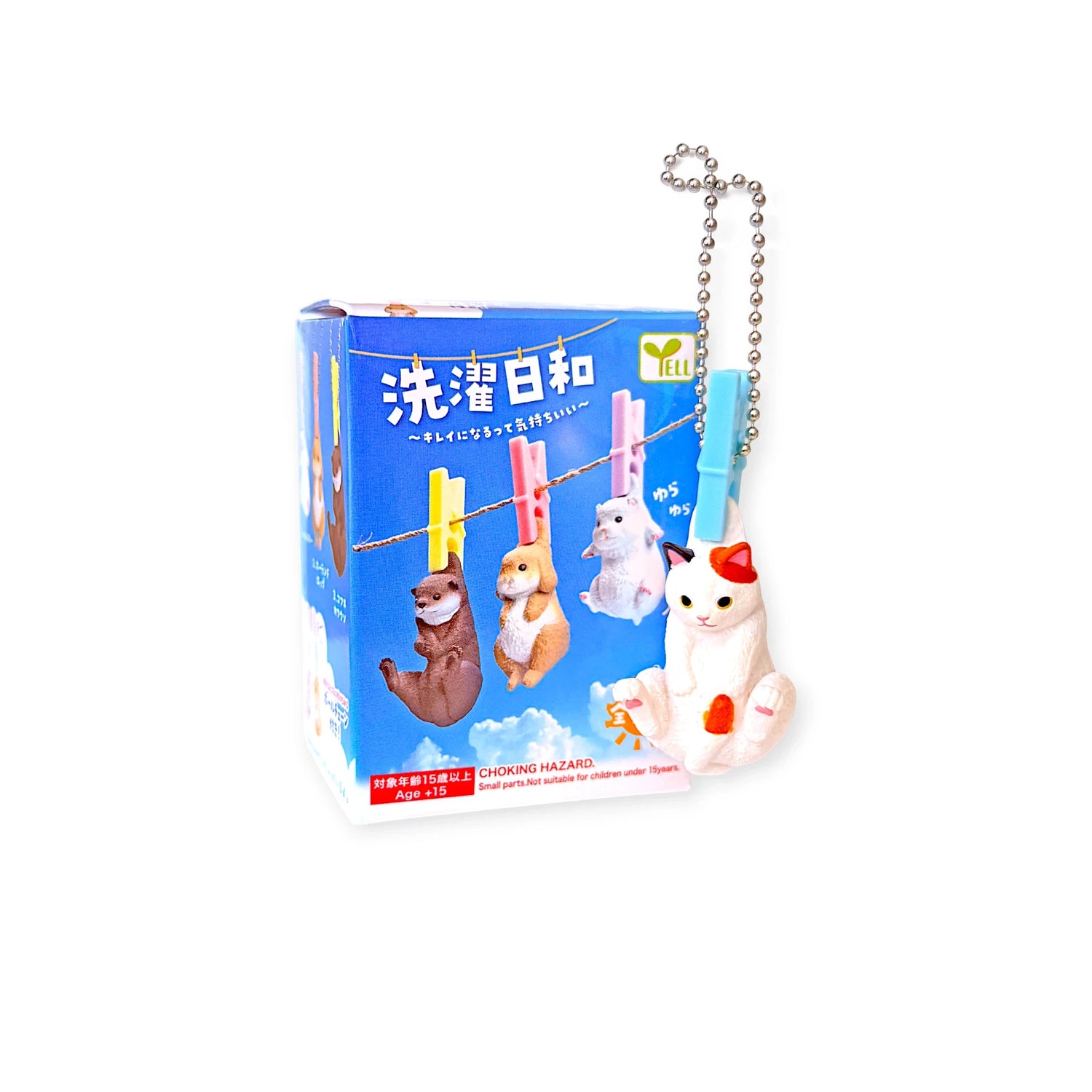The Yell Washing Line Critters Charm Blind Box features a surprise cat figurine keychain hanging from a blue clothespin, packaged in a blue box decorated with animal minifigures on a clothesline and Japanese text.