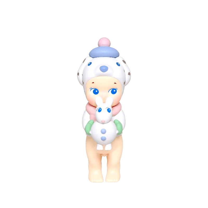 Sonny Angel Winter Wonderland mini figure holding a small blue animal figure